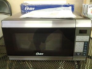 http://img0127.popscreencdn.com/182352119_oster-0-7-cu-ft-countertop-microwave-oven-ogt6701-parts-.jpg